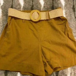 Woman’s loose relaxed belted dress shorts